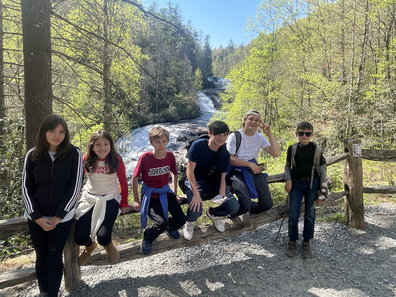 Students exploring a rocky riverbed in the Blue Ridge