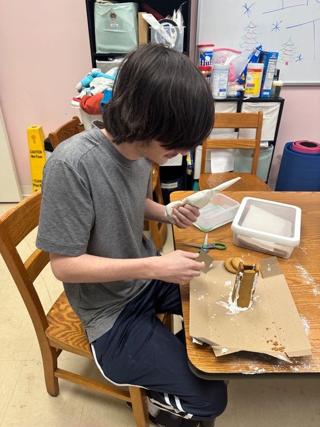 A student reading at his desk