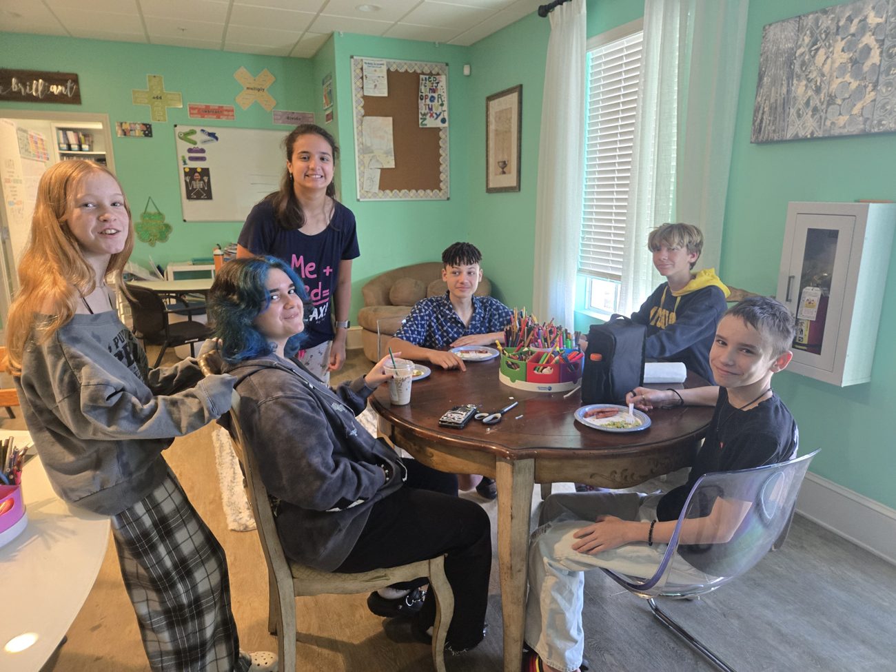 A small group working together in class