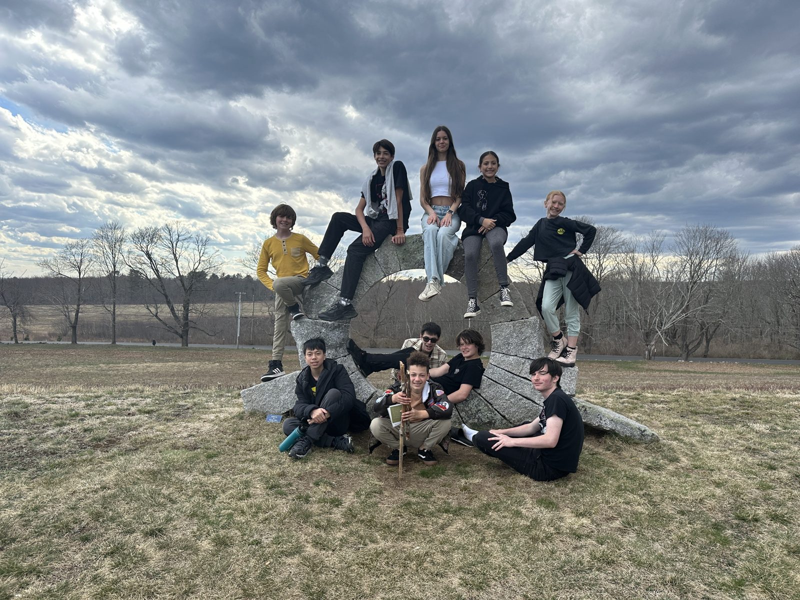 Students at a lighthouse on the Maine coast