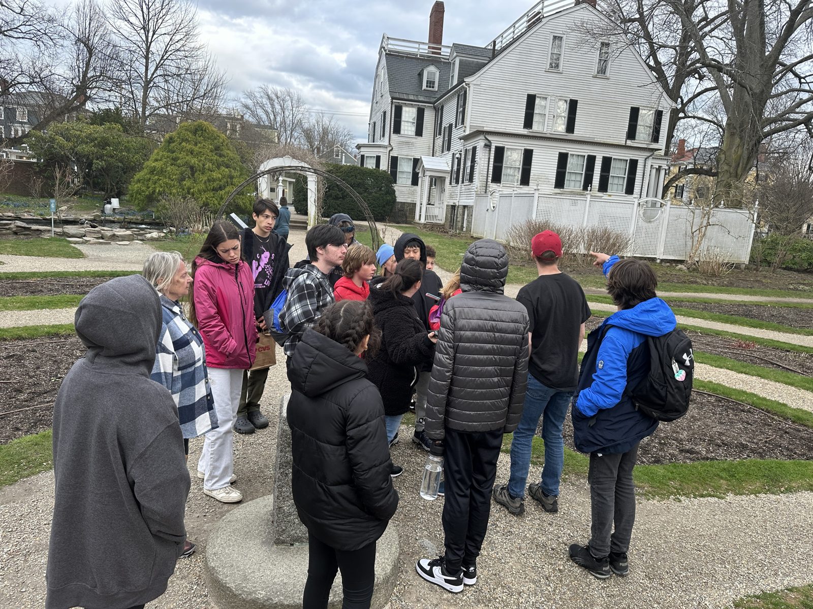 Students exploring a working harbor in coastal Maine